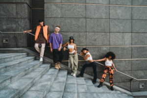 Young dancers in the city on stairs | Hip-Hop’s Biggest Casino Wins and Losses – Stories of High-Rolling Artists